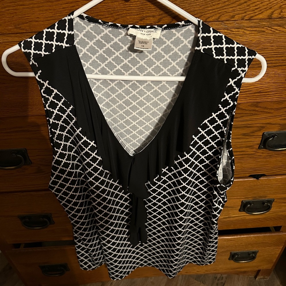 Black and White Sleeveless Blouse with V-Neck